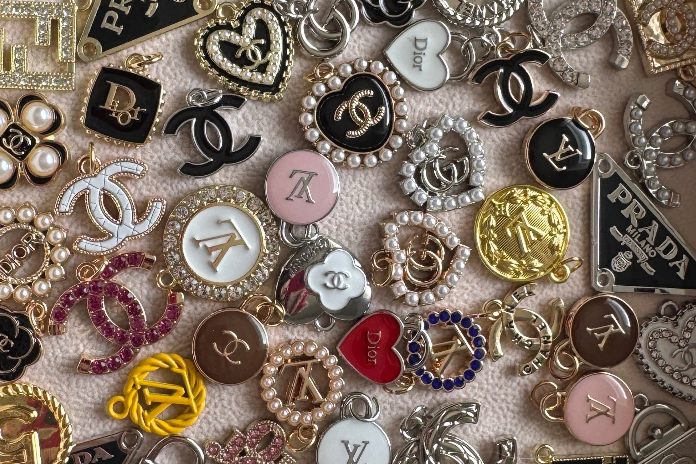 Collection of various designer buttons in a box